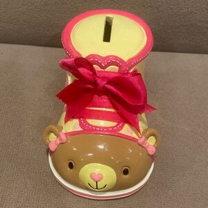 Ceramic yellow and pink Bear bank.  Cutest addition for a baby girls room. Used